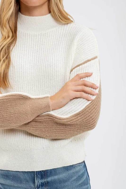 CALI COLORBLOCK MOCK NECK EXPOSED SEAM KNIT SWEATER
