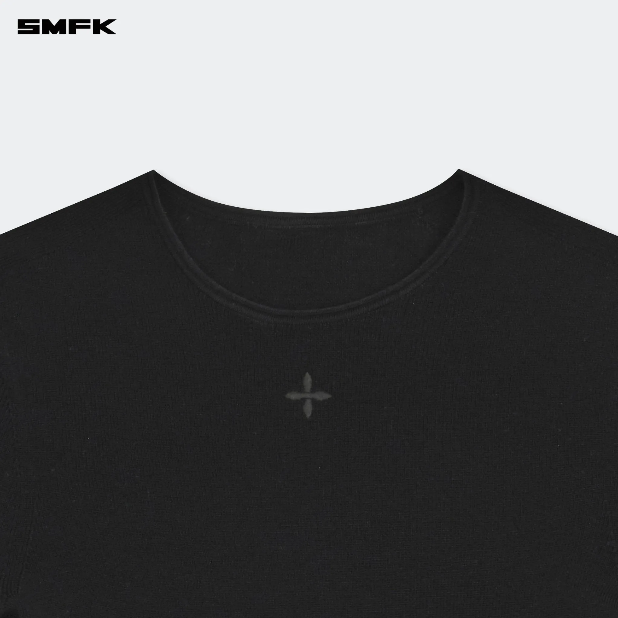 Compass Hug Knit Wool Top In Black
