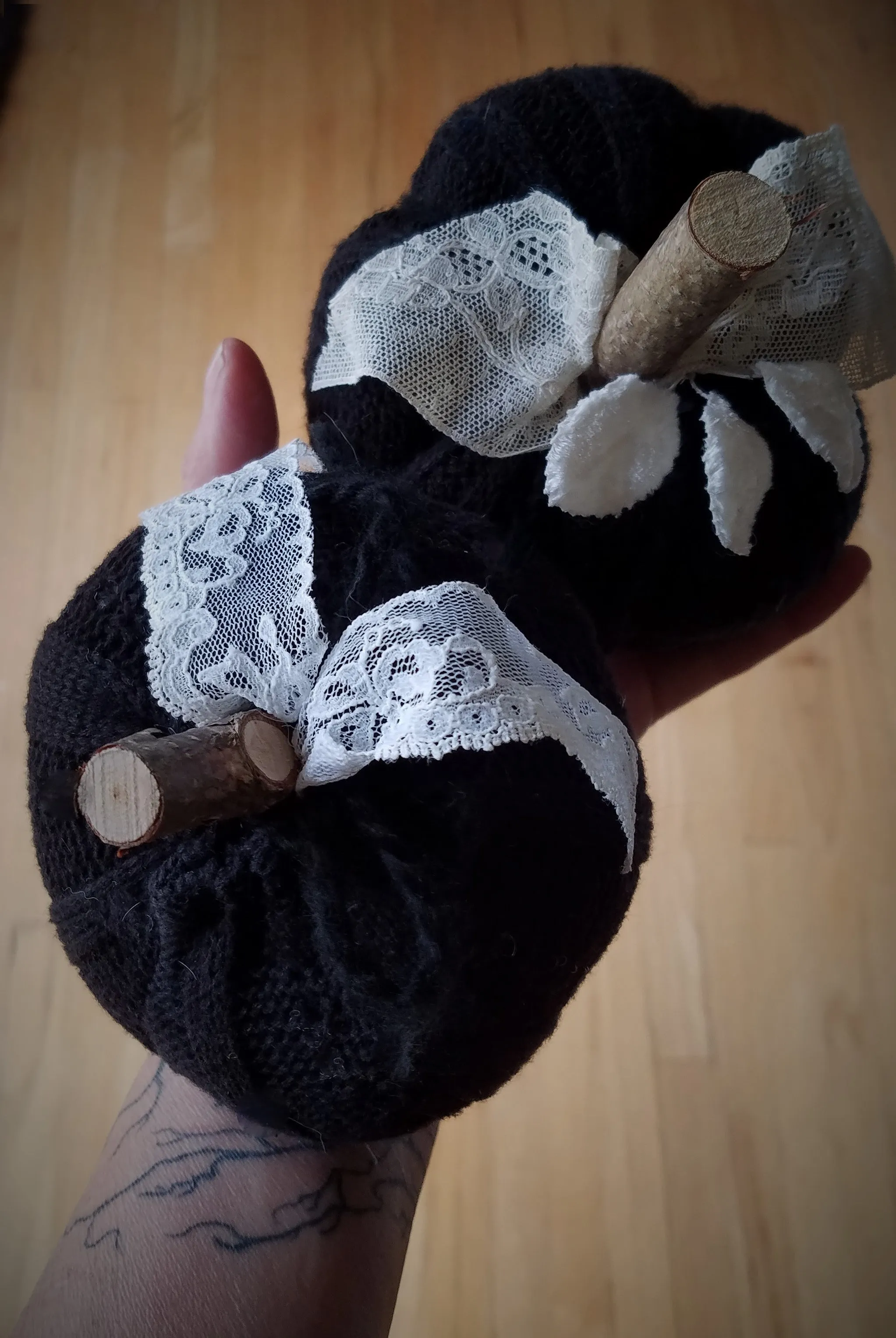 Knit Mini Pumpkin Pillow Pouf in Black with Ivory Lace and Wooden Stem