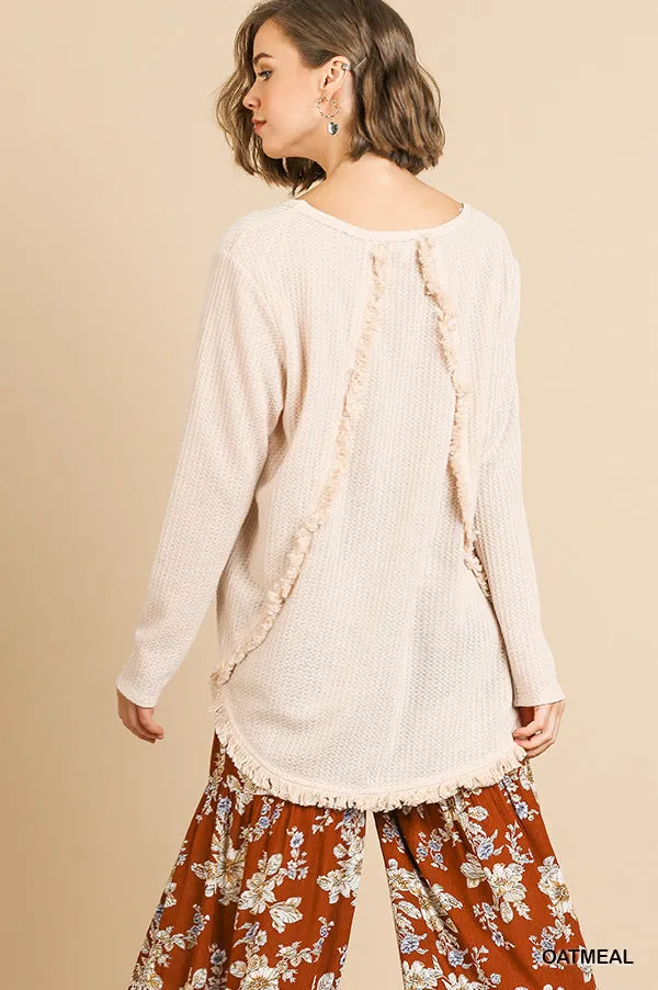 Long Sleeve Waffle Knit Round Neck Top with High Low Frayed Scoop Hem and Frayed Back Detail