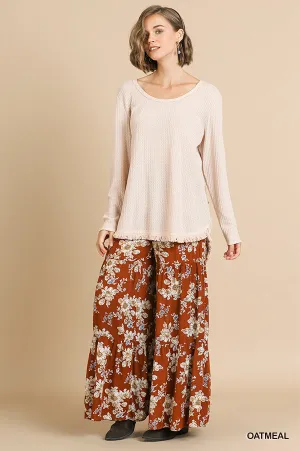 Long Sleeve Waffle Knit Round Neck Top with High Low Frayed Scoop Hem and Frayed Back Detail
