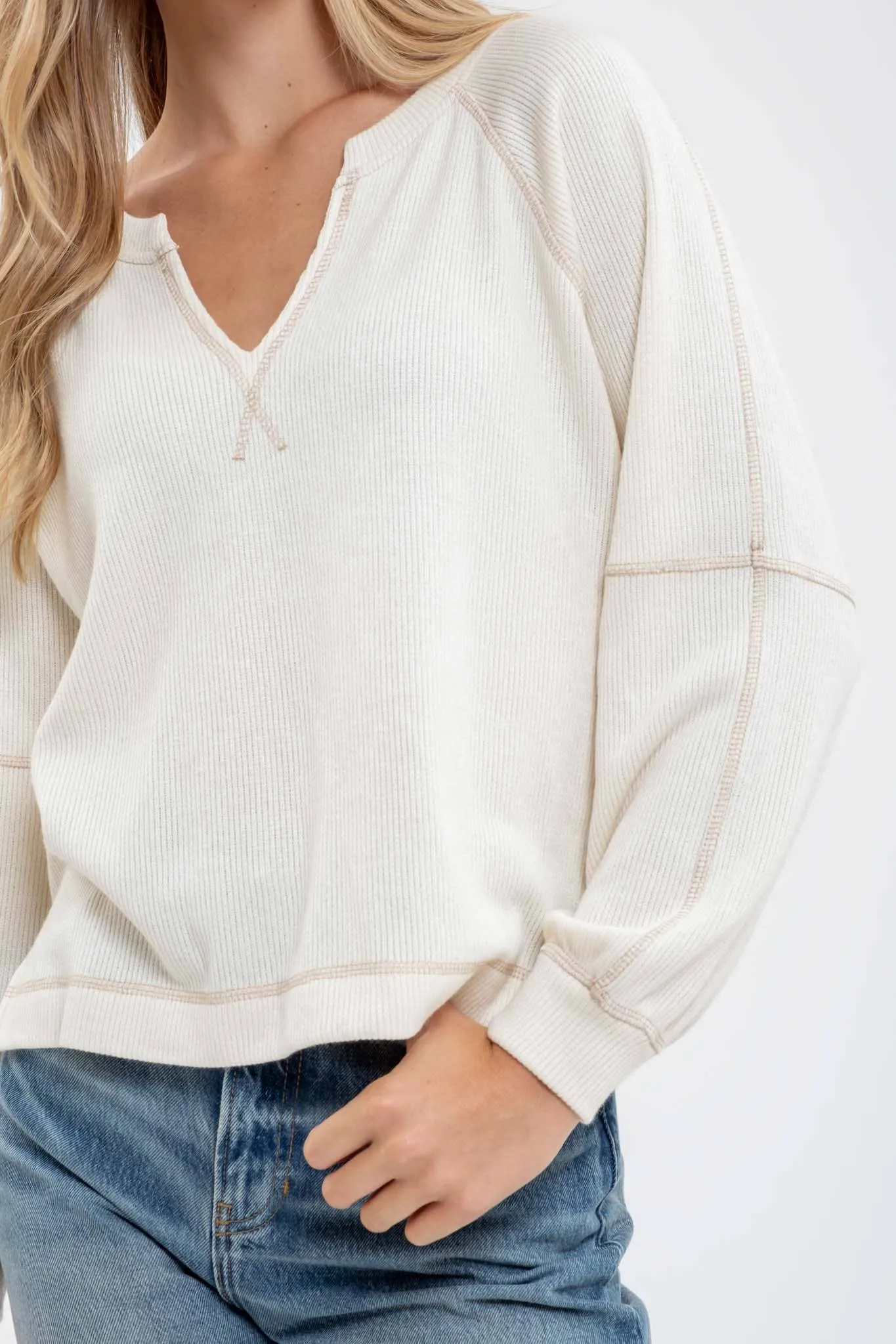SPLIT NECK LONG EXTENDED SLEEVE RAGLAN KNIT TOP