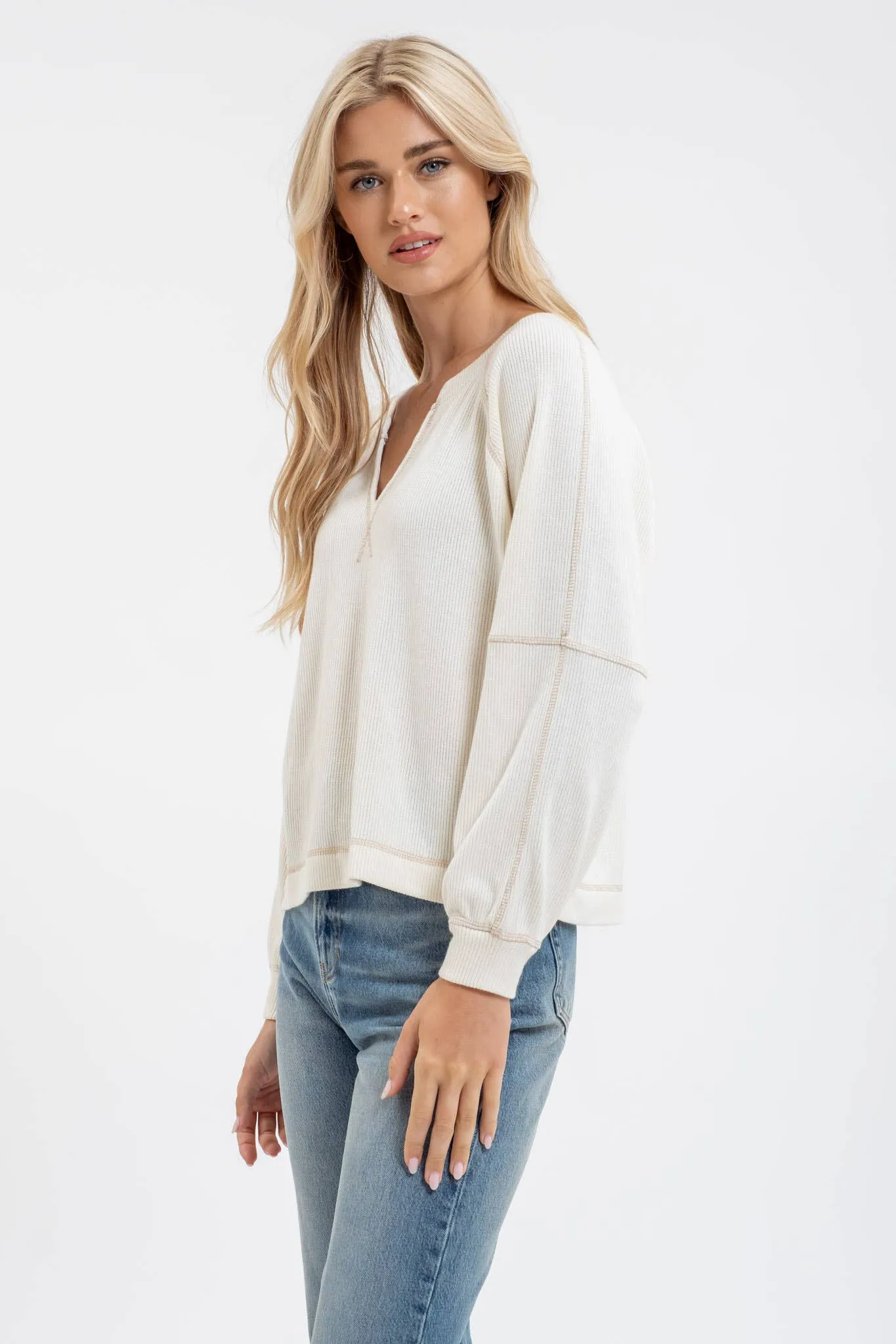 SPLIT NECK LONG EXTENDED SLEEVE RAGLAN KNIT TOP