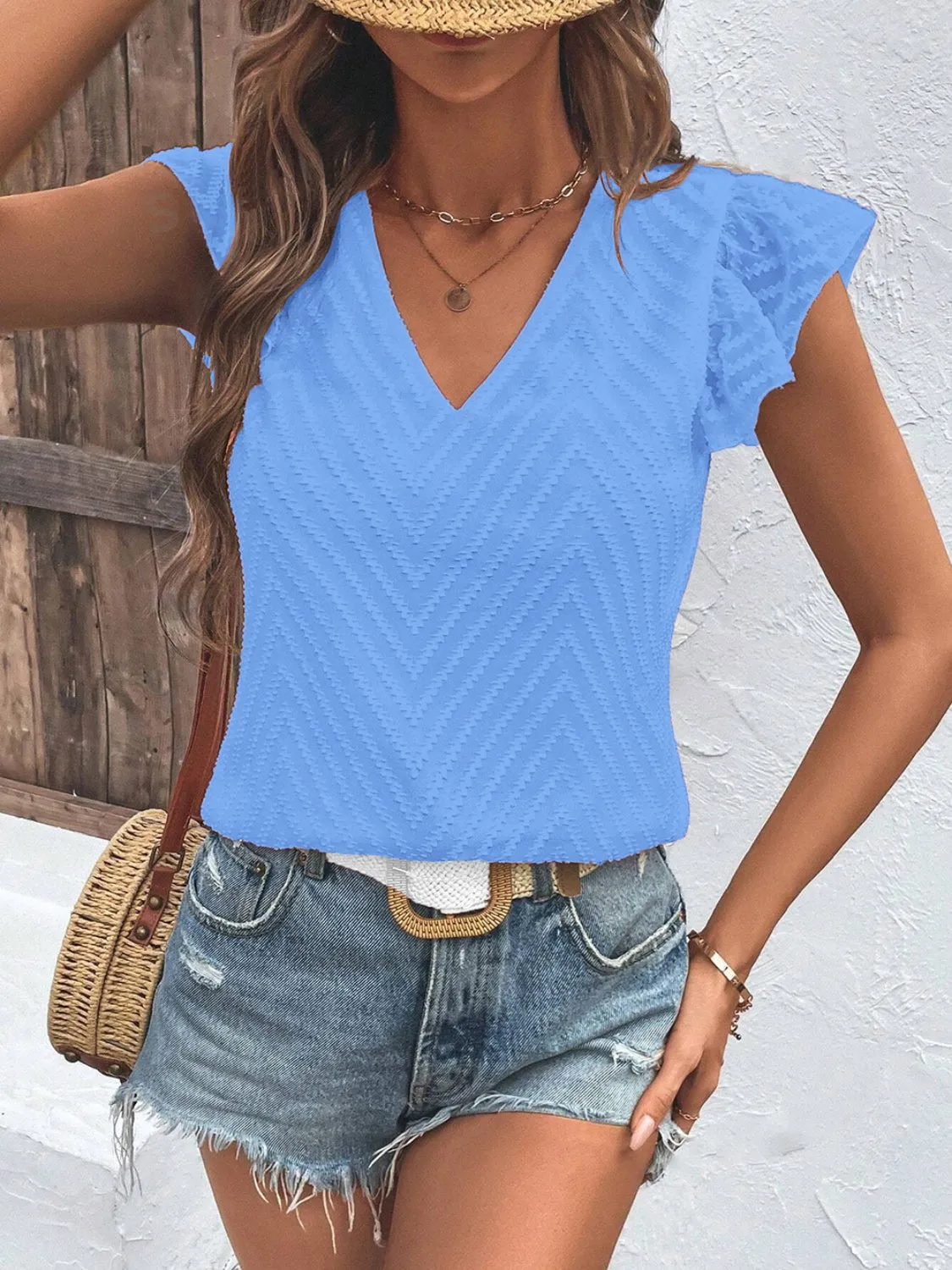 TEEK - Textured V-Neck Cap Sleeve Blouse