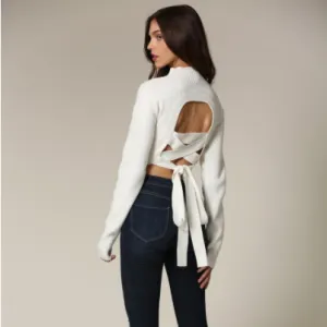 Vouss Knit Top Featuring a Lace Up Back